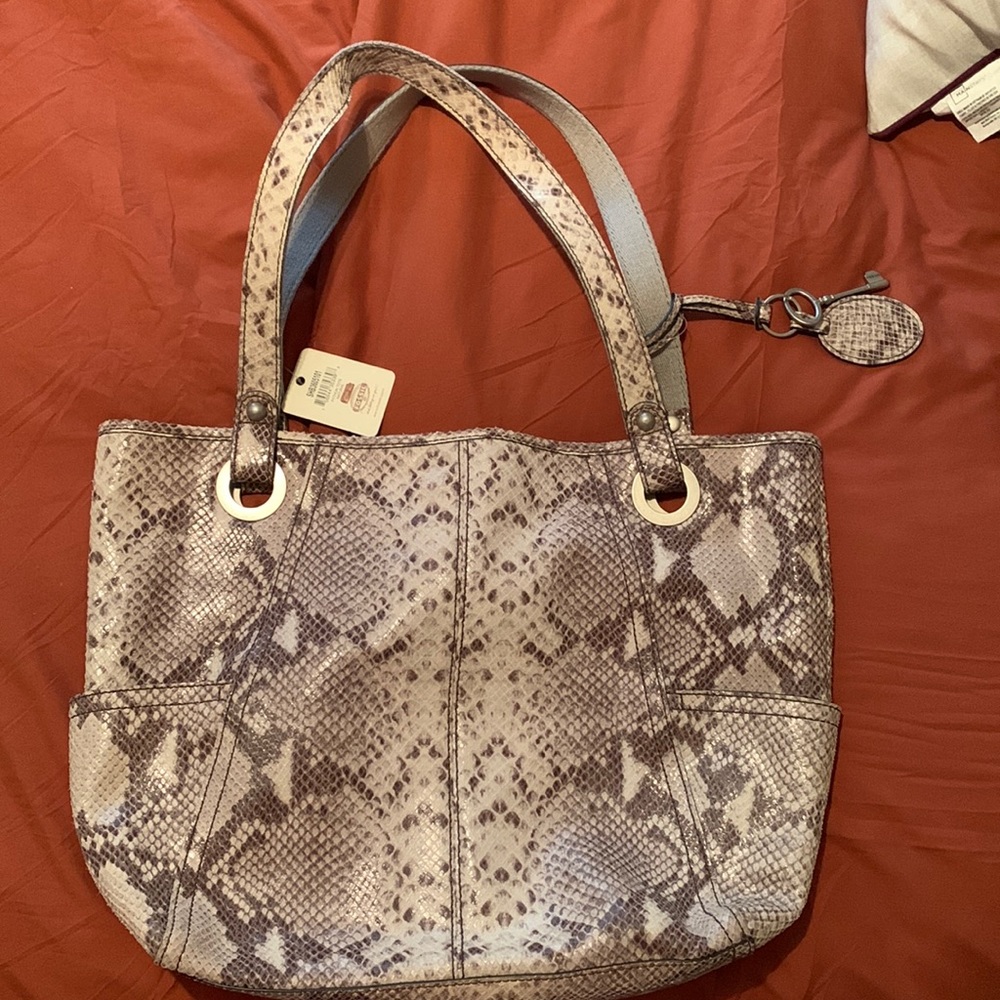 Fossil purse with tags